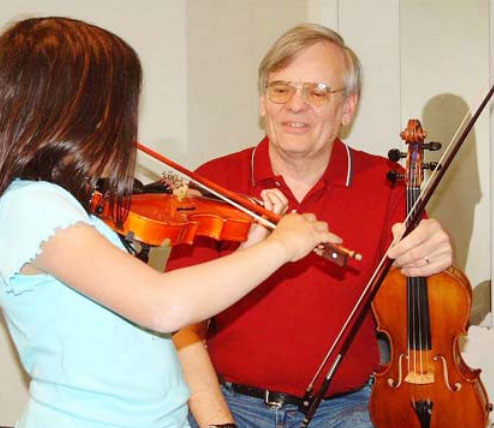 Jim with Violin Student